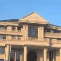 昌都黄金麻别墅外墙干挂石材效果示例