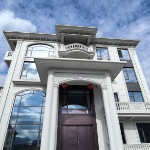 昌都白麻别墅外墙干挂石材效果示例