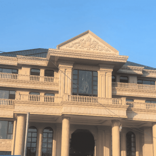 昌都黄金麻别墅外墙干挂石材效果示例