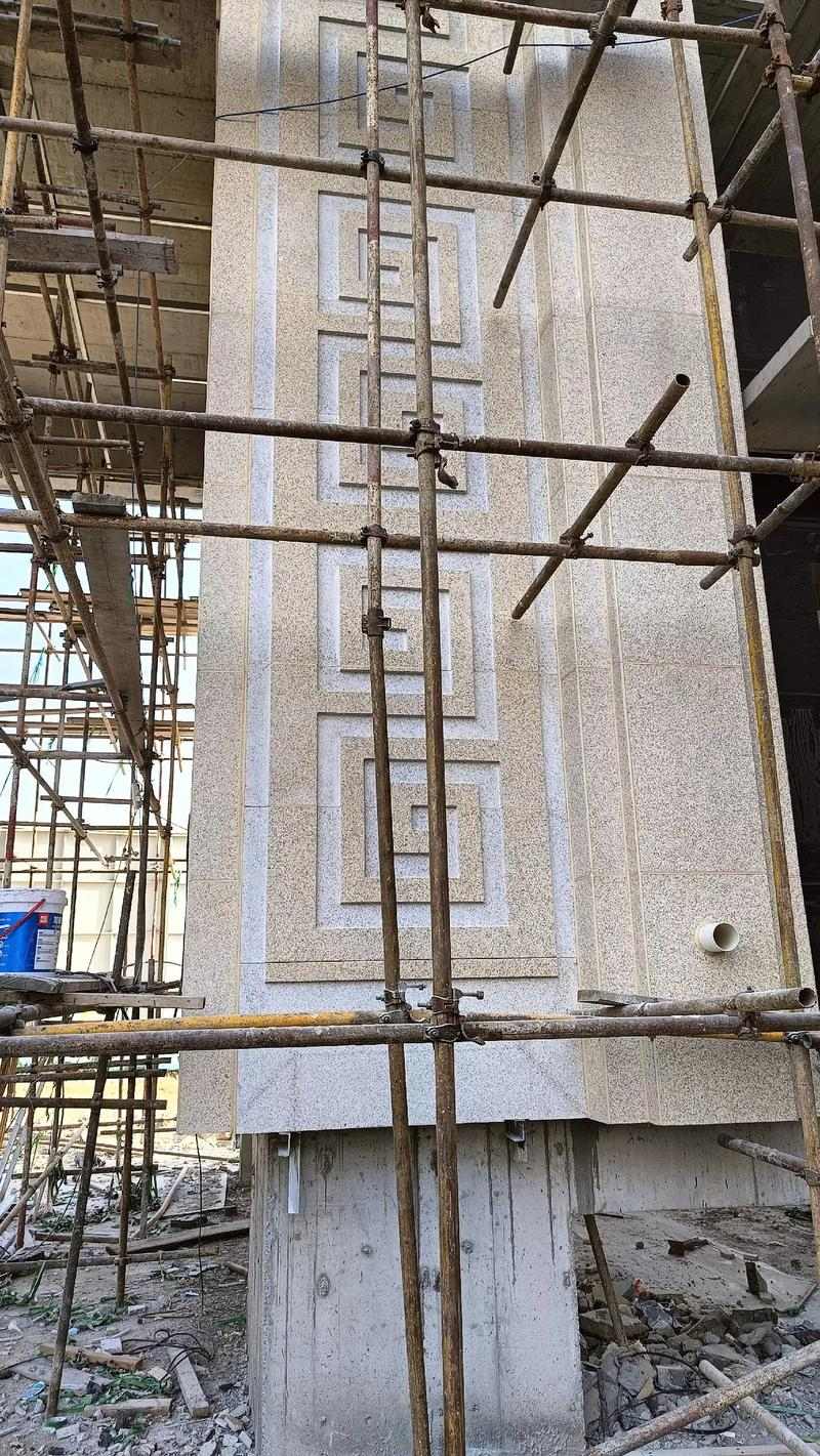 昌都 黄金麻花岗岩别墅外墙干挂回纹造型效果