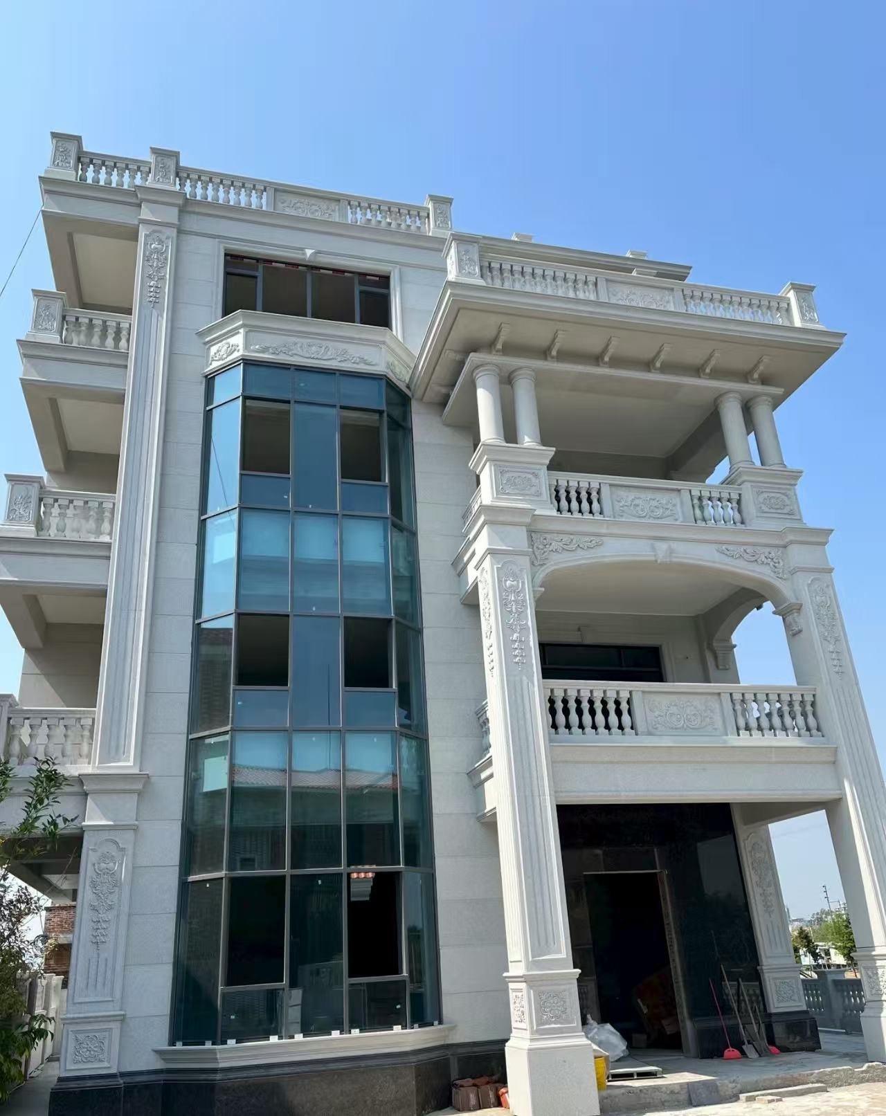 昌都 白麻花岗岩别墅外墙干挂效果展示