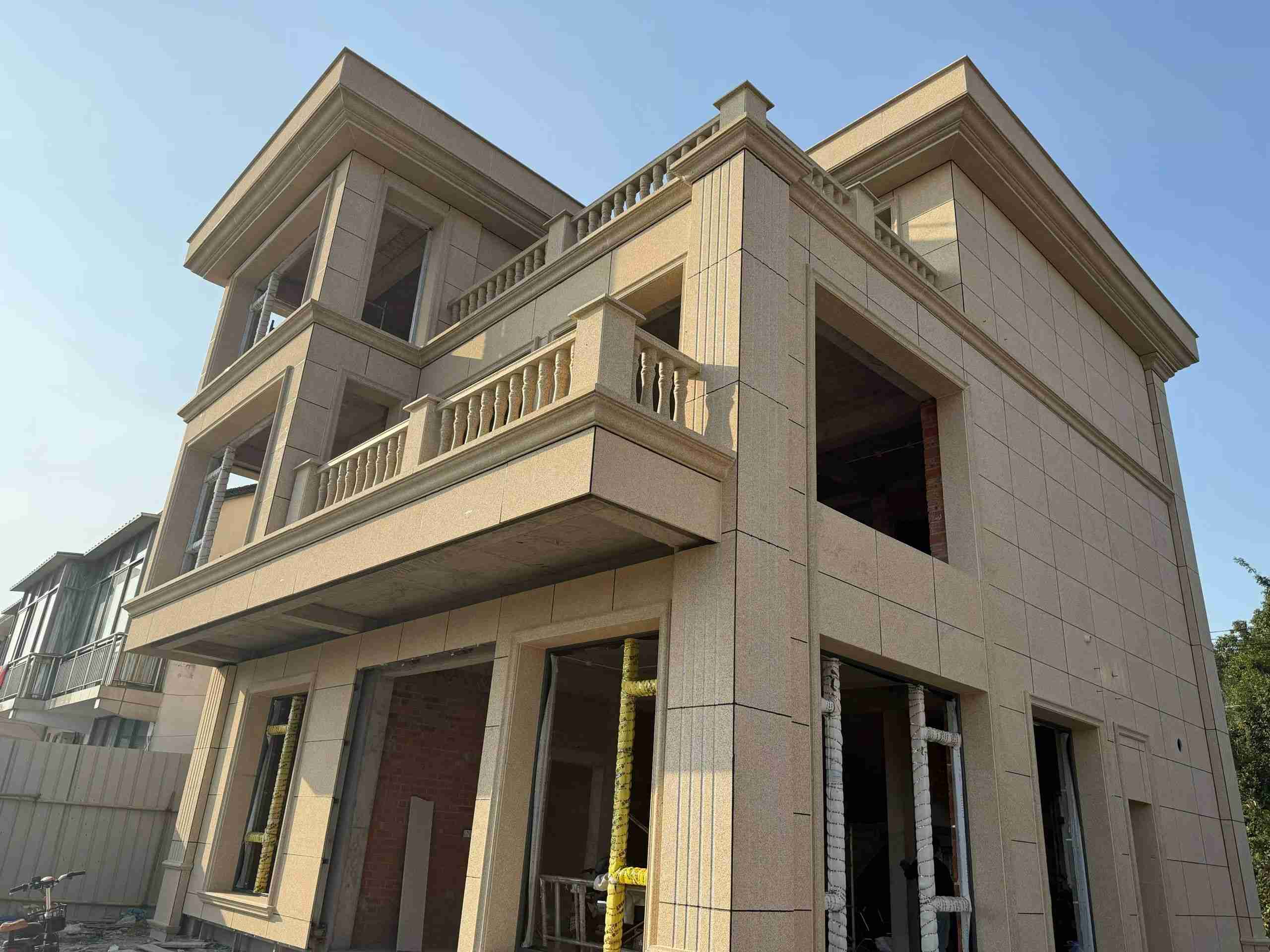 昌都 黄金麻花岗岩石材荔枝面外墙干挂效果展示